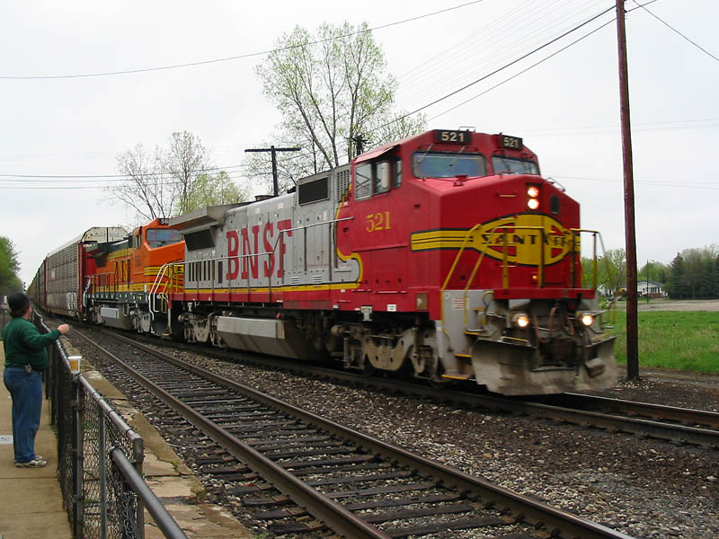 BNSF 521
BNSF #521 heads from the Holly sub towards Chicago on this loaded autorack train. 05/01/04 
