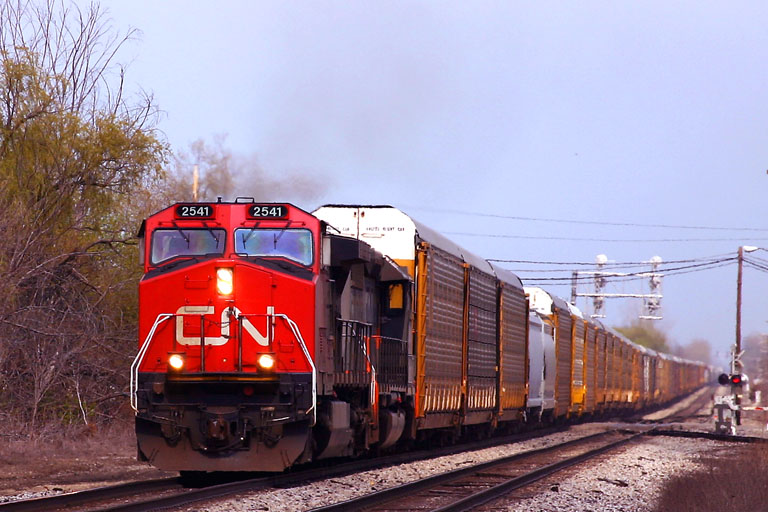 CN 2541
CN 2541 leads another westbound through Durand.  04/30/05
