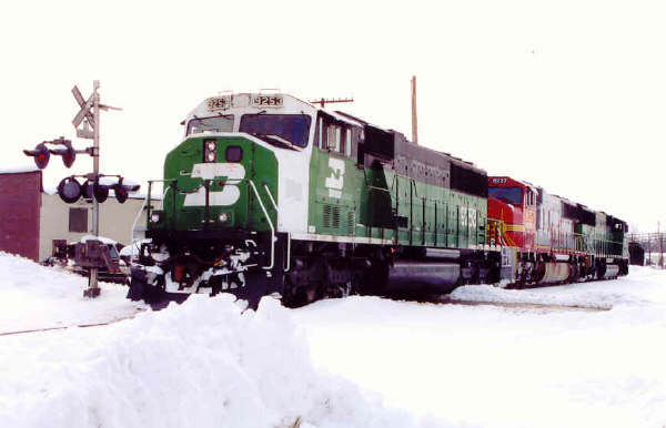 BNSF 9253
BNSF 9253 plows through Grandville, MI in an unique lash-up for West Olive bound coal trains. Photo used with permission from WMRP. 
