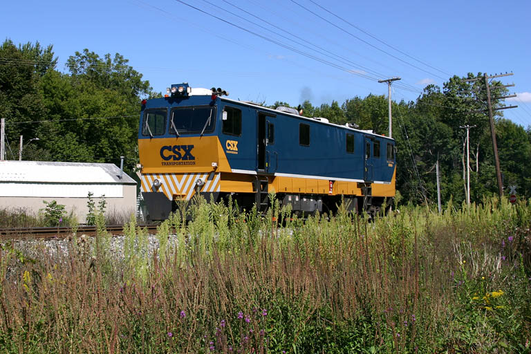 CSX GRMS1
CSX GRMS1, on a special CSX W004, head west past Jenison. Tried a bit of a different shot because of a bunch of guys collecting cans and garbage out of the creek. 09/09/04 
