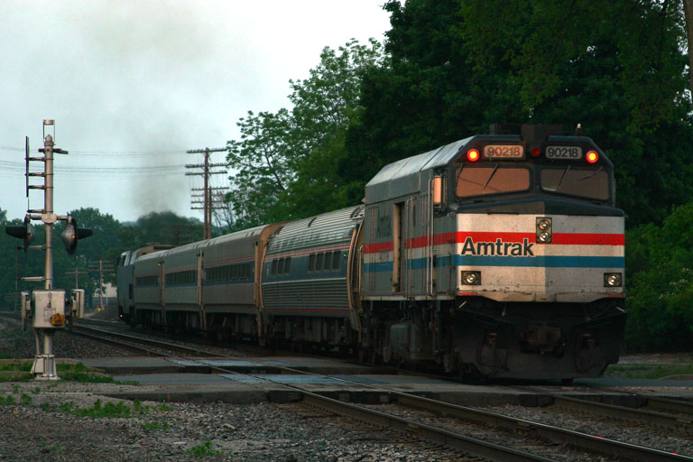 Amtrak 90218
A late Amtrak 364 leaves the East Lansing depot about 45 minutes late.  Amtrak 35 leads cabbage Amtrak 90218.  06/04/05
