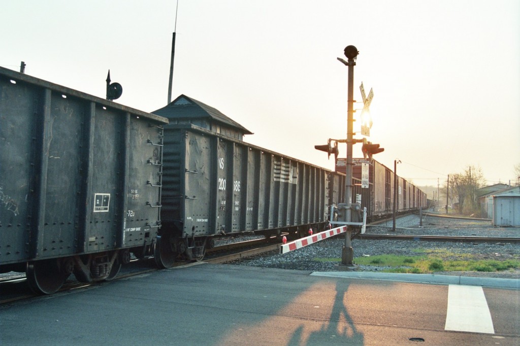 NS 39J at BO Tower
The engines powering train 39J back down into Botsford Yard to make an unusually long pickup.  In such a case, the train will stay on the MC mainline at BO Tower rather then risking a derailment on the wye to the BO Secondary.  April 2005.
Keywords: BO Tower 39J Kalamazoo