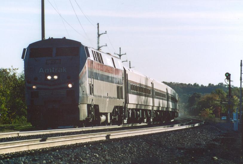 Amtrak P42DC #29
Phase III painted Genesis #29 sweeps Amtrak train #352, the Lake Cities, around the curve at Oliver St. in Kalamazoo, near the WMU campus.  The ITCS equipped P42s (#26-#37, #126-#128) are normally assigned to these trains, and the lower block were some of the last to sport the aging Phase III paint colors.  October, 2003.
Keywords: Amtrak P42 Genesis 29 Lake Cities 352 Kalamazoo signal