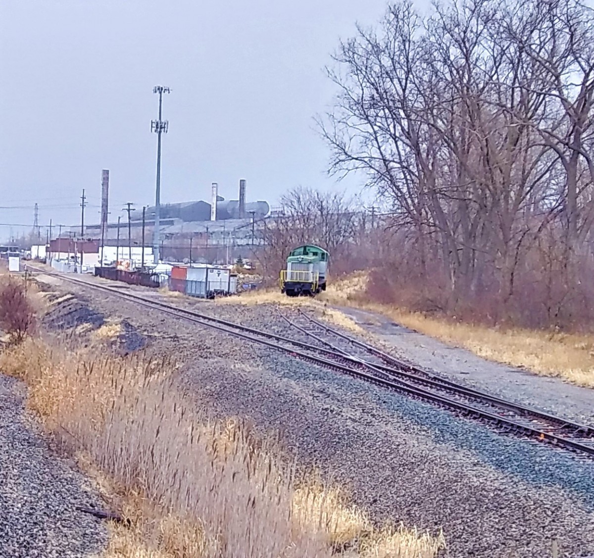 IRON MIKE on the move, sort of.
Having been moved from within the old McLouth plant and awaiting inspection and pick up. Sits on the Highline track. A quick grab with the cell phone.
Keywords: iron mike