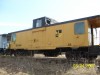 CABOOSE WEST OF CLARE ON TRACKS.JPG