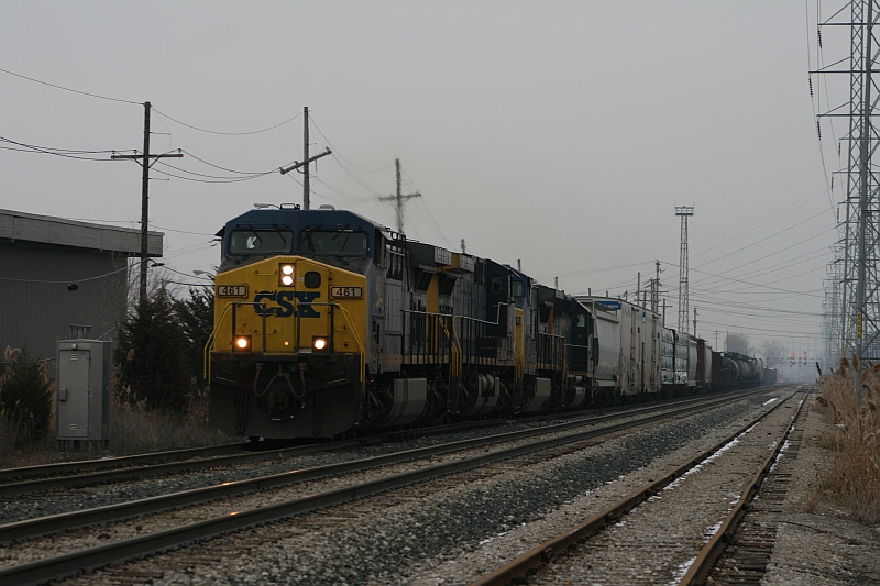 Q327-04
LIVONIA, MI (CSX DETROIT SUB-CH 18.4; MERRIMAN RD)            JANUARY 4, 2009
1440-CSX 461 (AC4400CW)-CSX 323 (AC4400CW)-CSX 7825 (C40-8W)-CSX (YN3) 8138 (SD40-2)-WB-Q327-04 (Detroit Rougemere Yard-Chicago Barr Yard)-28 mixed freight (3 reefers)

