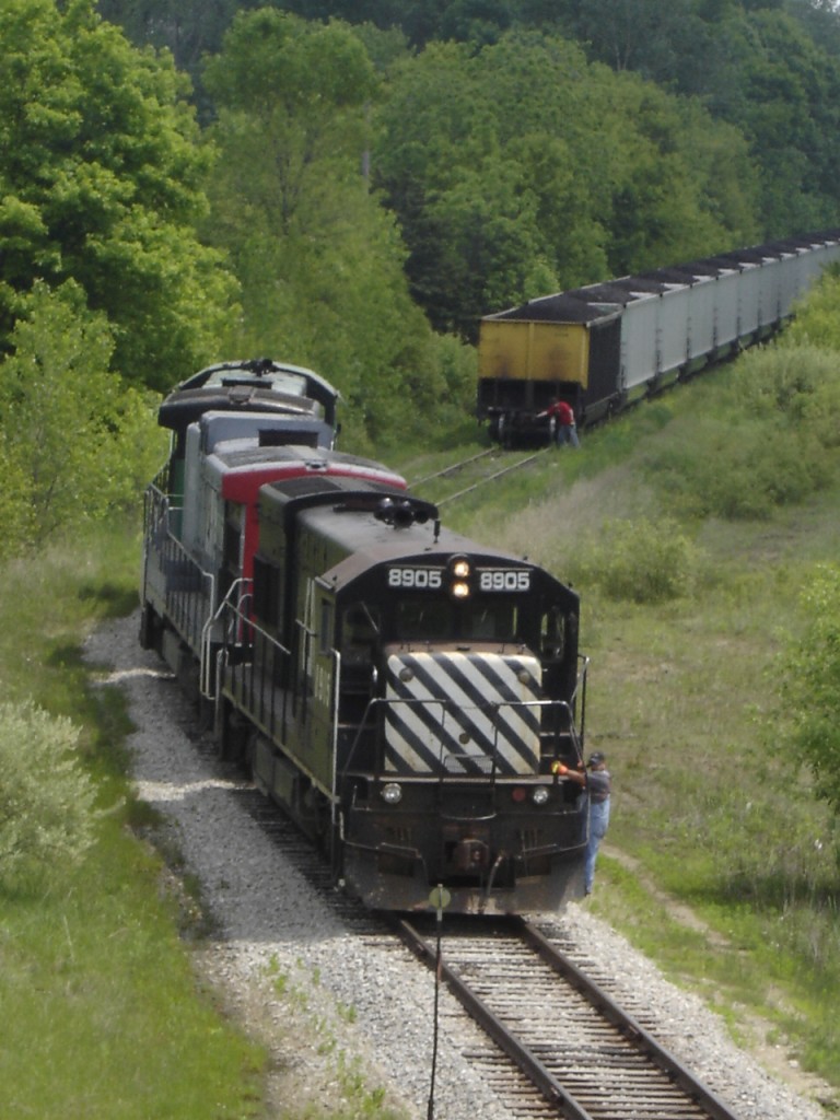 Coal Train Pick Up
In Durand Yard C.M. attaches to a coal train bound for Midland
