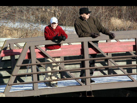 Myself in Kent City, MI
J T took this shot of myself and grandpa on the pedsetrian bridge in Kent City, MI. We were waiting for Marquette Rail's Santa Train to Finish up with their stop in town. 
