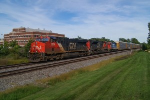 CN train A451 passing through East Lansing, MI w/ GT 5936 in tow. Thursday September 15, 2016.