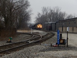 Conductor throws the switch at Gibson.  1 boxcar is on Arvco's spur.
