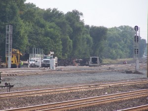 A closer look at the back of 10E and 8E. The new signal bridge is under construction in the background. Look close and you can see the end of the old South Freight.