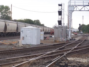 Old signal cabinets in the way of the new Kalamazoo Branch track ... new signal cabinet waiting for current Track 2 to be removed for it to be placed in the ground.