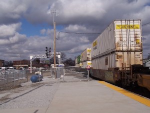 A stack train heads east