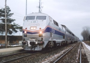 Amtrak 355 with Superliners, ExpressTrak reefers and a Heritage Baggage Car, early 2003.