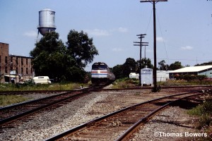 Amtrak #311 Southbound on the Kalamazoo Branch with a Detour train at 4th St. Three Rivers, Mi. 7-1983
