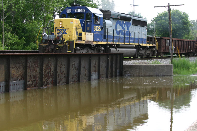 CSX 8135
CSX #8135 heads west past Jenison over a very flooded creek near the Grand River. 05/27/04 
