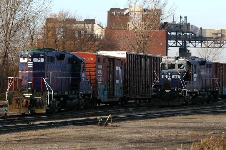 MMRR 179 & 180
MMRR 179 and MMRR 180 wait in the North Yard...if that's even what it's called anymore... with crews on duty.  11/11/05
