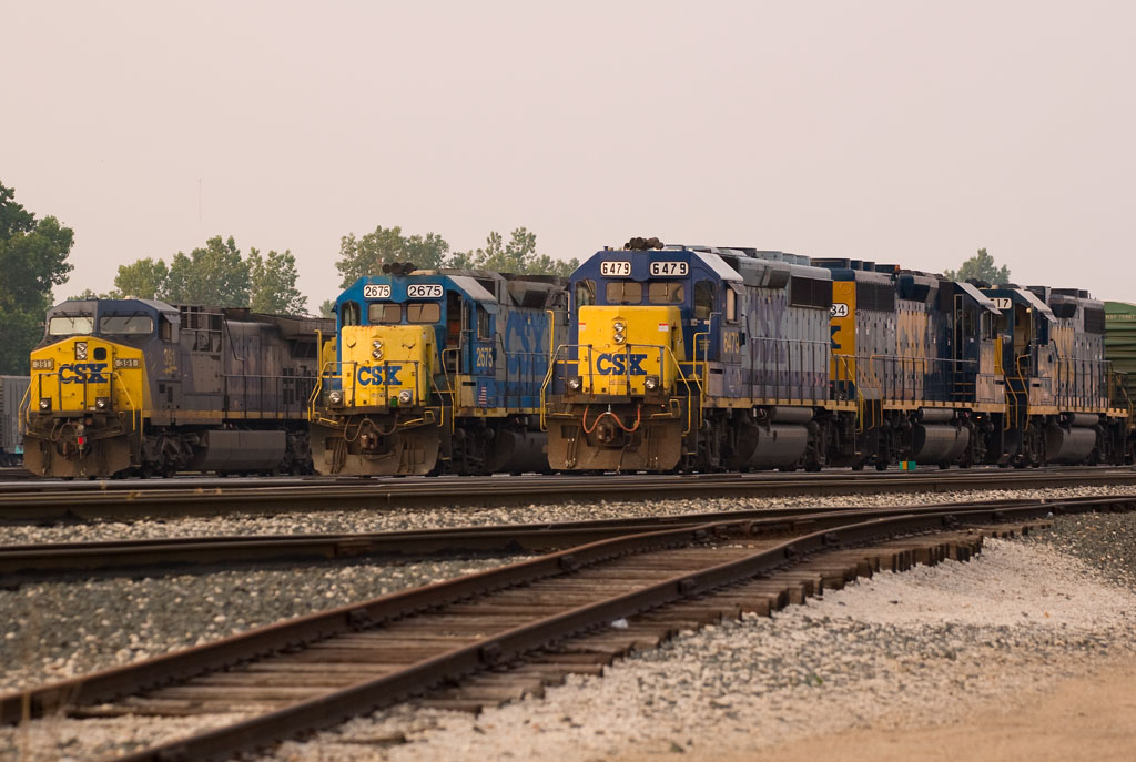 CSXT 6479
Good 'ol lineup of power is seen just before the sun went behind the trees at the west end of Wyoming Yard.  06/17/07
