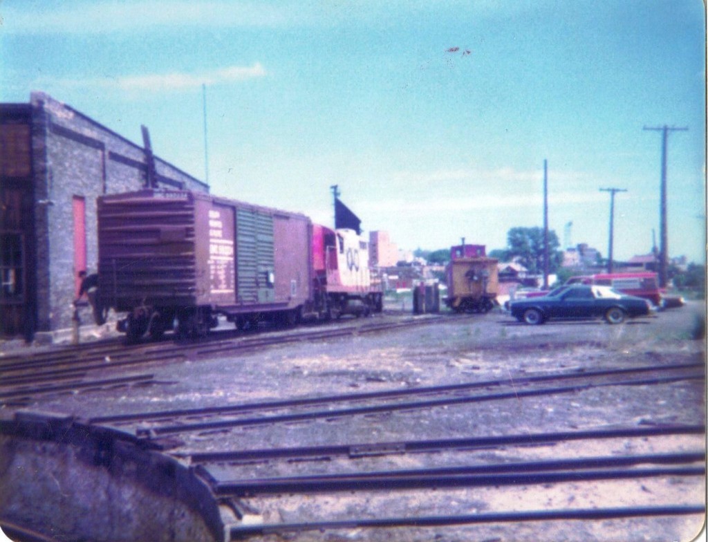 Boxcar with bad order door being turned for delivery to Bunny Bread
