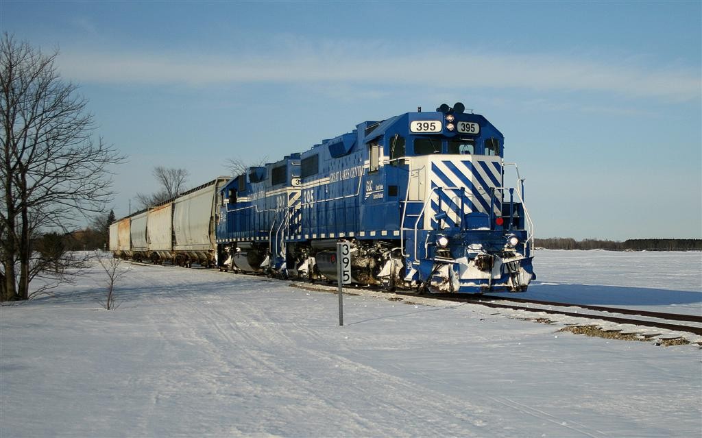 GLC 26 March 2014
Great Lakes Central 395-398 passing mp 395 on the Northern District with southbound cars from Petoskey.
