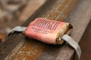 Railroad_torpedo_with_lead_straps.jpg